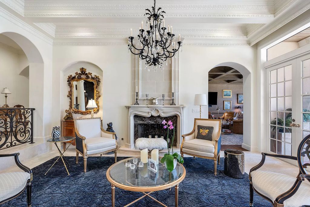 Discover unparalleled luxury at 336 E Coconut Palm Road in the prestigious Royal Palm Yacht & Country Club.