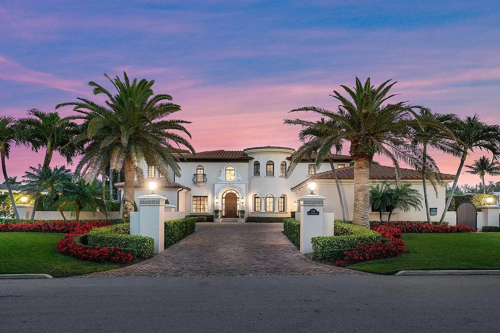 Discover unparalleled luxury at 336 E Coconut Palm Road in the prestigious Royal Palm Yacht & Country Club.