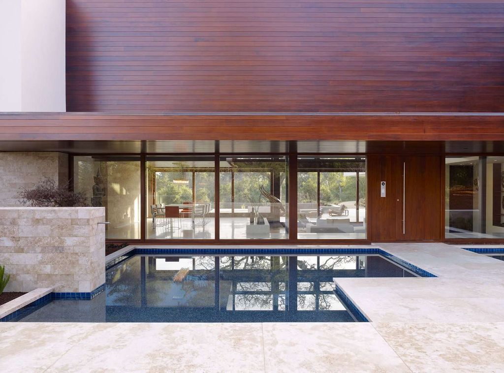 Oz Residence Features L-shape by SWATT + PARTNERS