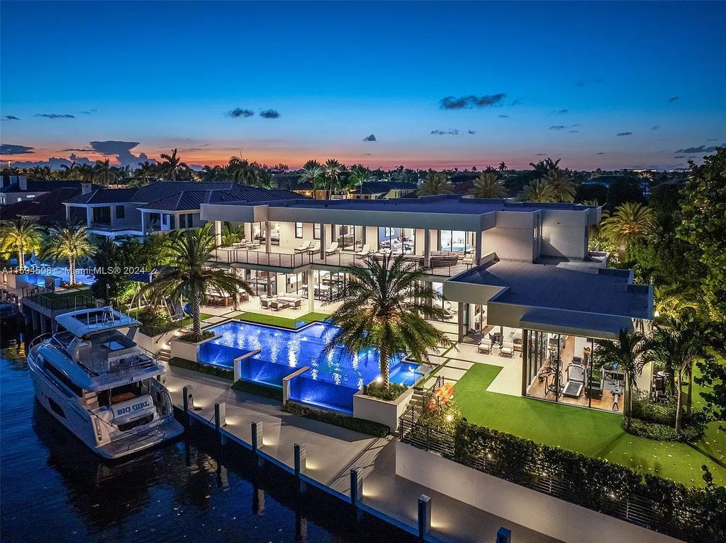Welcome to 298 W Key Palm Rd, a spectacular newly built waterfront estate by SRD Building Corp. Located in Boca Raton's prestigious Royal Palm Yacht & Country Club, this luxurious home offers over 11,471 square feet of living space on a 26,728 square feet lot.