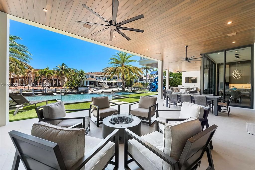 Welcome to 298 W Key Palm Rd, a spectacular newly built waterfront estate by SRD Building Corp. Located in Boca Raton's prestigious Royal Palm Yacht & Country Club, this luxurious home offers over 11,471 square feet of living space on a 26,728 square feet lot.