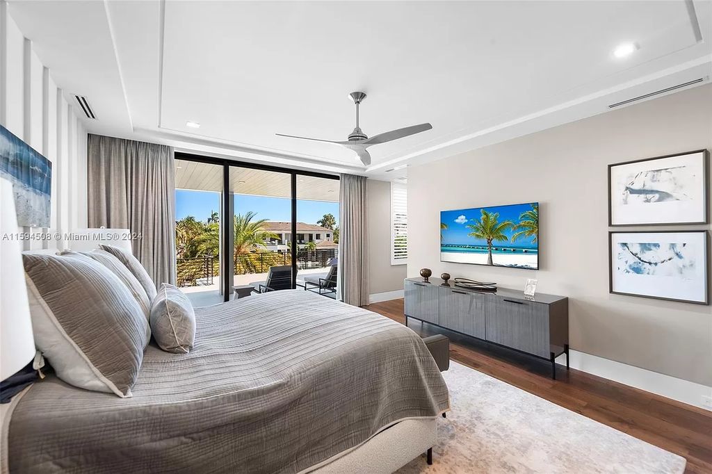 Welcome to 298 W Key Palm Rd, a spectacular newly built waterfront estate by SRD Building Corp. Located in Boca Raton's prestigious Royal Palm Yacht & Country Club, this luxurious home offers over 11,471 square feet of living space on a 26,728 square feet lot.