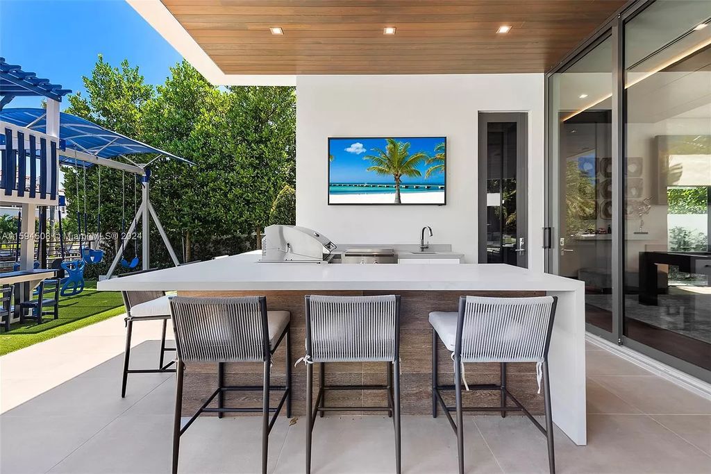 Welcome to 298 W Key Palm Rd, a spectacular newly built waterfront estate by SRD Building Corp. Located in Boca Raton's prestigious Royal Palm Yacht & Country Club, this luxurious home offers over 11,471 square feet of living space on a 26,728 square feet lot.