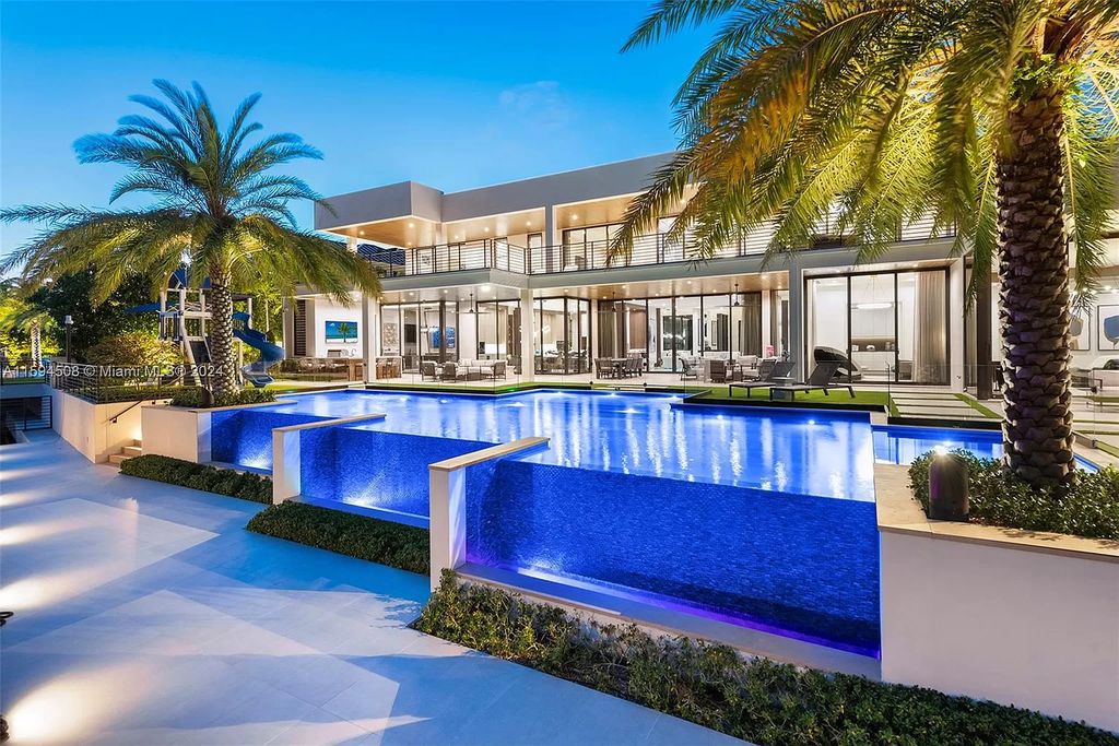 Welcome to 298 W Key Palm Rd, a spectacular newly built waterfront estate by SRD Building Corp. Located in Boca Raton's prestigious Royal Palm Yacht & Country Club, this luxurious home offers over 11,471 square feet of living space on a 26,728 square feet lot.