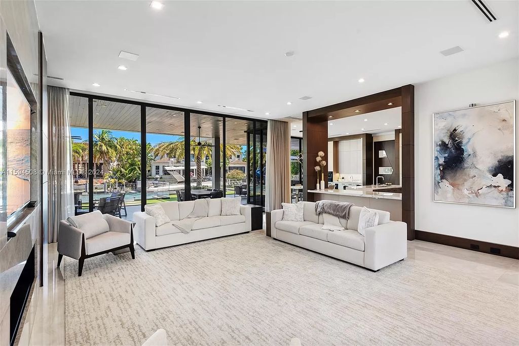 Welcome to 298 W Key Palm Rd, a spectacular newly built waterfront estate by SRD Building Corp. Located in Boca Raton's prestigious Royal Palm Yacht & Country Club, this luxurious home offers over 11,471 square feet of living space on a 26,728 square feet lot.