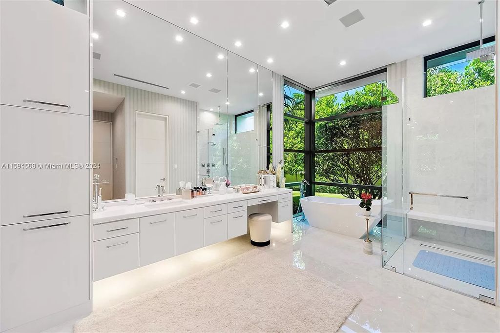 Welcome to 298 W Key Palm Rd, a spectacular newly built waterfront estate by SRD Building Corp. Located in Boca Raton's prestigious Royal Palm Yacht & Country Club, this luxurious home offers over 11,471 square feet of living space on a 26,728 square feet lot.