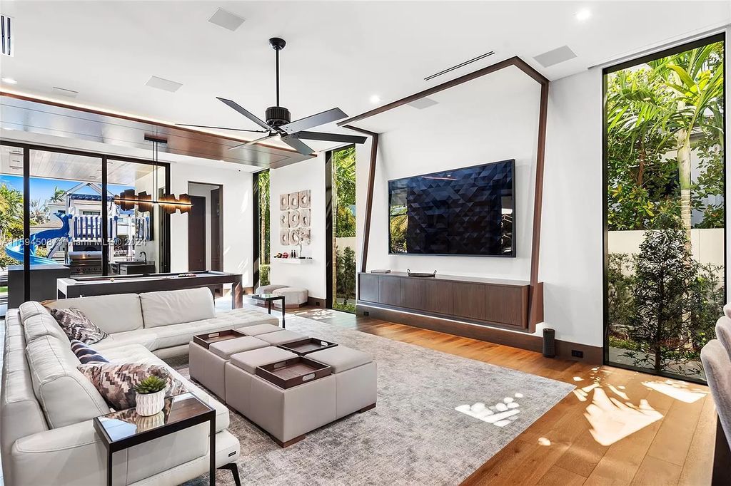Welcome to 298 W Key Palm Rd, a spectacular newly built waterfront estate by SRD Building Corp. Located in Boca Raton's prestigious Royal Palm Yacht & Country Club, this luxurious home offers over 11,471 square feet of living space on a 26,728 square feet lot.