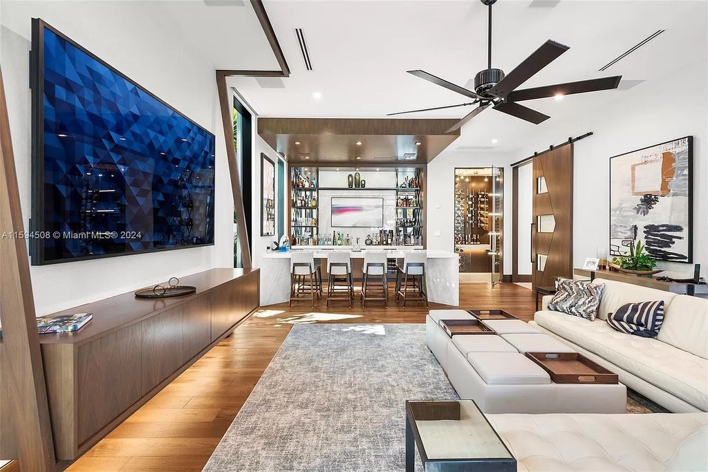 Welcome to 298 W Key Palm Rd, a spectacular newly built waterfront estate by SRD Building Corp. Located in Boca Raton's prestigious Royal Palm Yacht & Country Club, this luxurious home offers over 11,471 square feet of living space on a 26,728 square feet lot.
