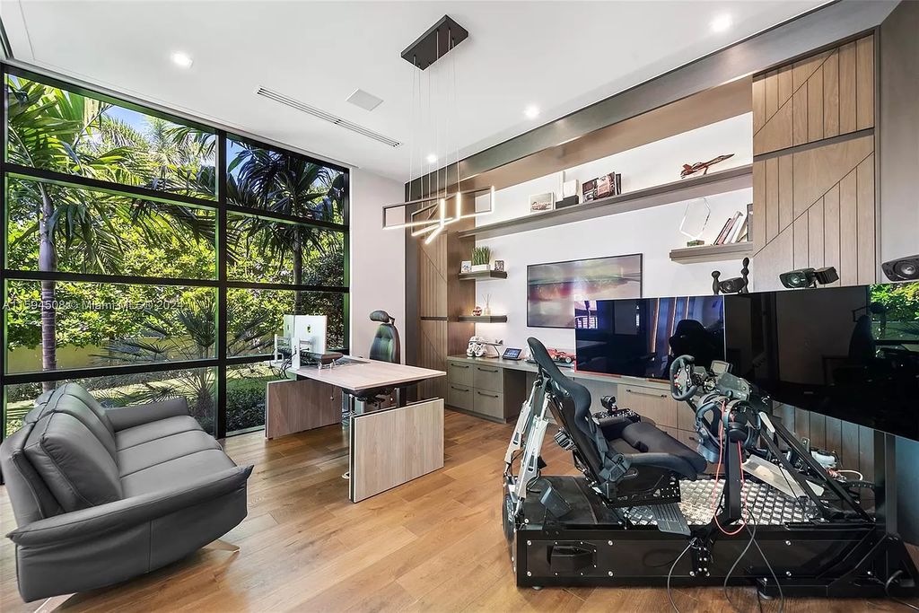 Welcome to 298 W Key Palm Rd, a spectacular newly built waterfront estate by SRD Building Corp. Located in Boca Raton's prestigious Royal Palm Yacht & Country Club, this luxurious home offers over 11,471 square feet of living space on a 26,728 square feet lot.