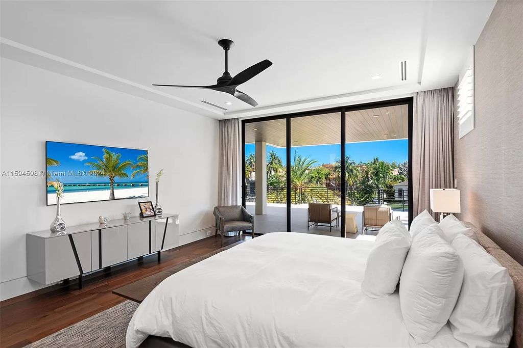 Welcome to 298 W Key Palm Rd, a spectacular newly built waterfront estate by SRD Building Corp. Located in Boca Raton's prestigious Royal Palm Yacht & Country Club, this luxurious home offers over 11,471 square feet of living space on a 26,728 square feet lot.