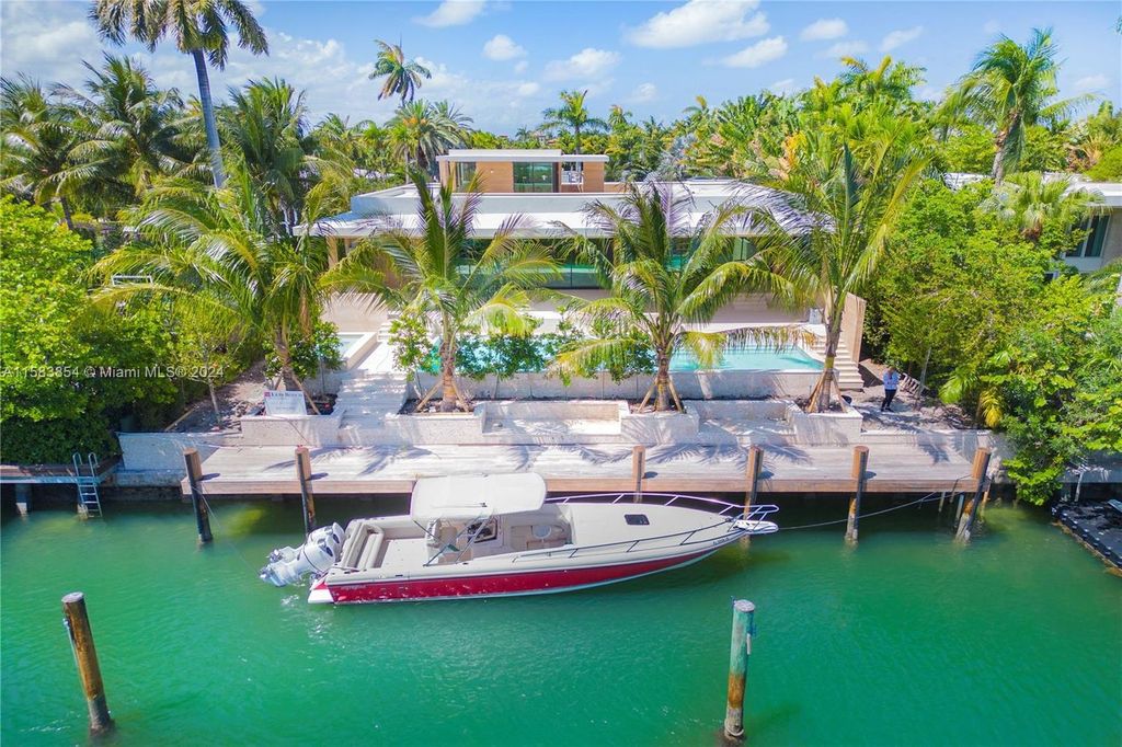 Nestled within Sunset Islands III, this luxurious Miami Beach property at 1510 W 23rd St offers the epitome of waterfront living.