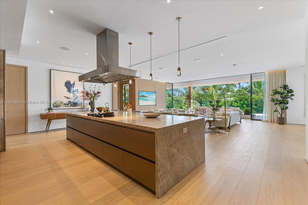 Nestled within Sunset Islands III, this luxurious Miami Beach property at 1510 W 23rd St offers the epitome of waterfront living.