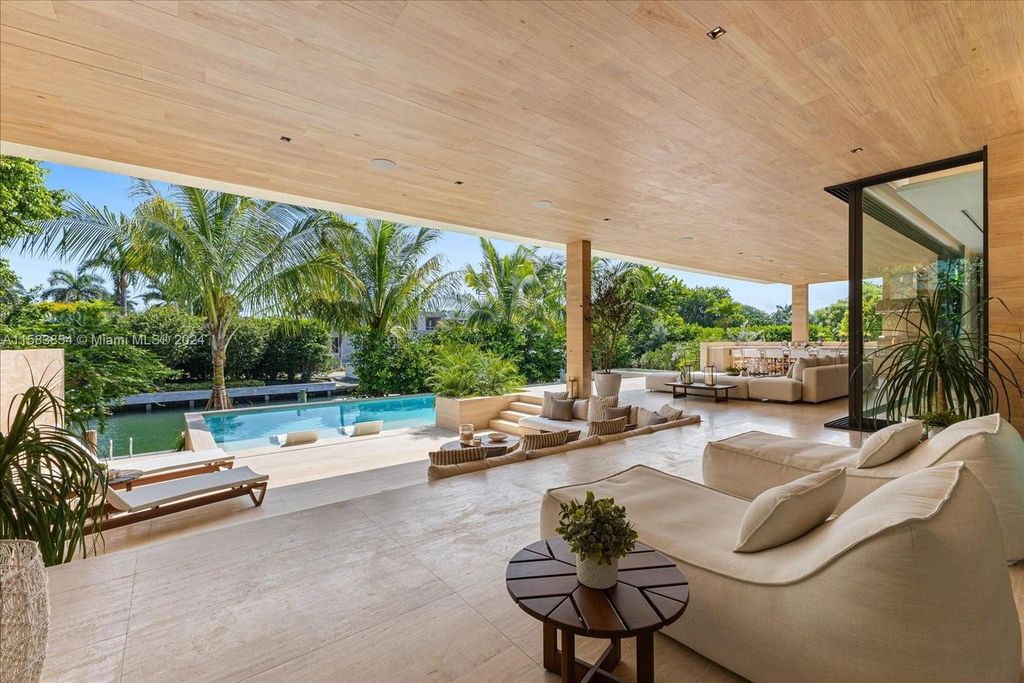 Nestled within Sunset Islands III, this luxurious Miami Beach property at 1510 W 23rd St offers the epitome of waterfront living.