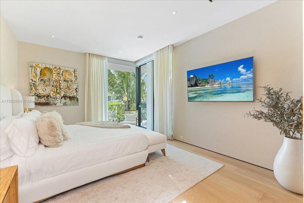 Nestled within Sunset Islands III, this luxurious Miami Beach property at 1510 W 23rd St offers the epitome of waterfront living.