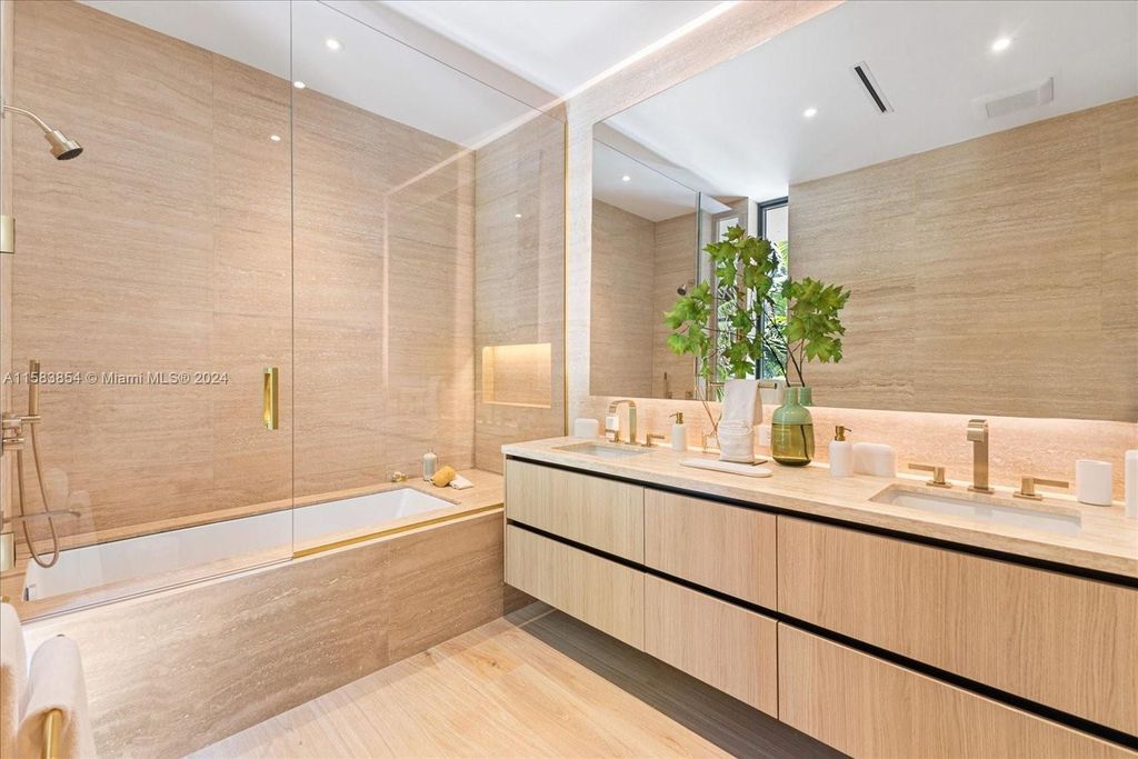Nestled within Sunset Islands III, this luxurious Miami Beach property at 1510 W 23rd St offers the epitome of waterfront living.