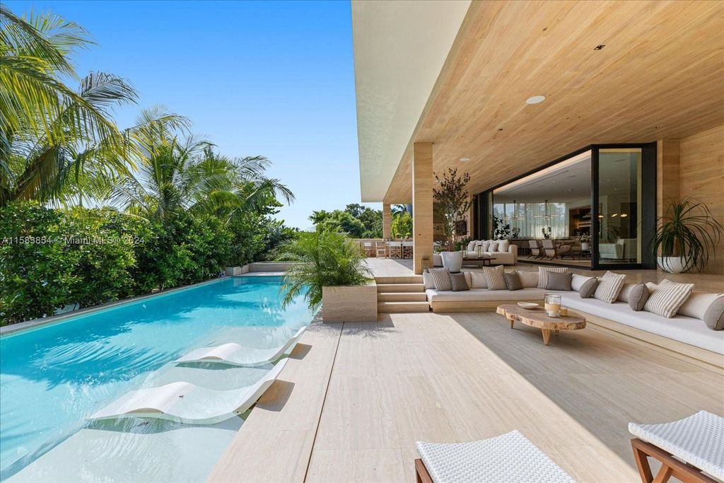 Nestled within Sunset Islands III, this luxurious Miami Beach property at 1510 W 23rd St offers the epitome of waterfront living.