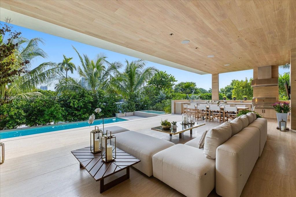 Nestled within Sunset Islands III, this luxurious Miami Beach property at 1510 W 23rd St offers the epitome of waterfront living.