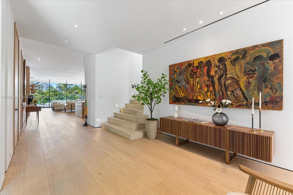 Nestled within Sunset Islands III, this luxurious Miami Beach property at 1510 W 23rd St offers the epitome of waterfront living.