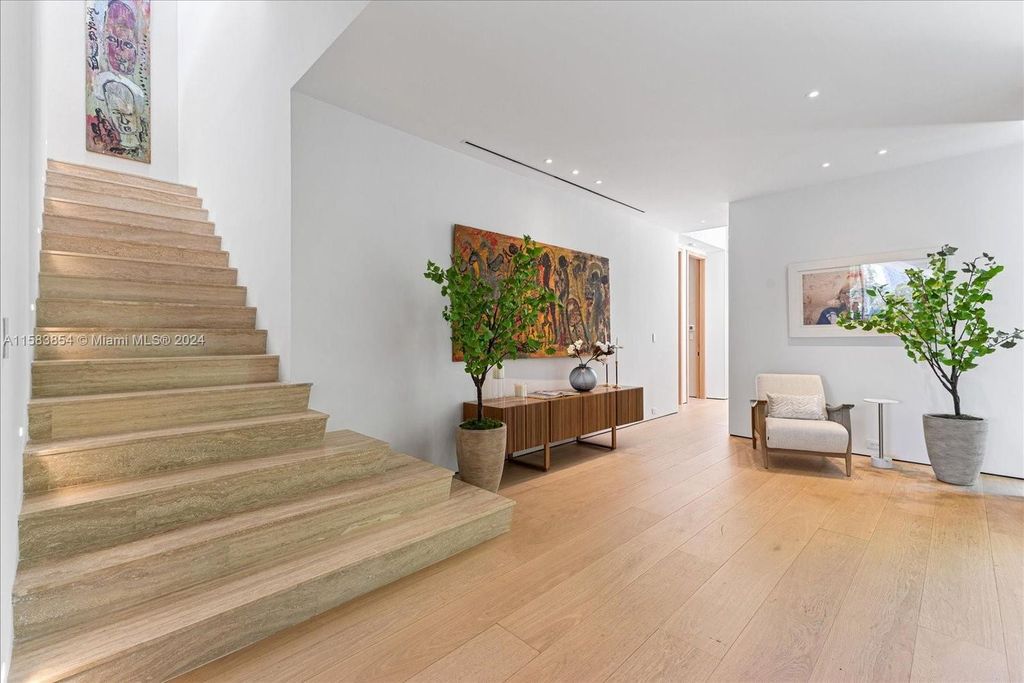Nestled within Sunset Islands III, this luxurious Miami Beach property at 1510 W 23rd St offers the epitome of waterfront living.