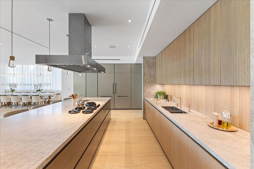 Nestled within Sunset Islands III, this luxurious Miami Beach property at 1510 W 23rd St offers the epitome of waterfront living.