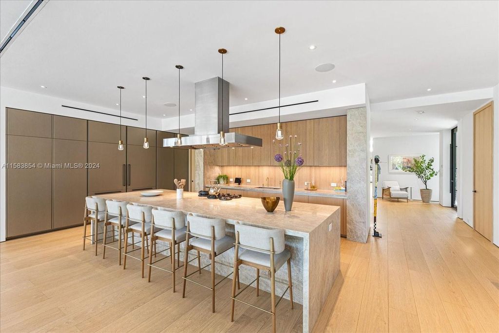 Nestled within Sunset Islands III, this luxurious Miami Beach property at 1510 W 23rd St offers the epitome of waterfront living.