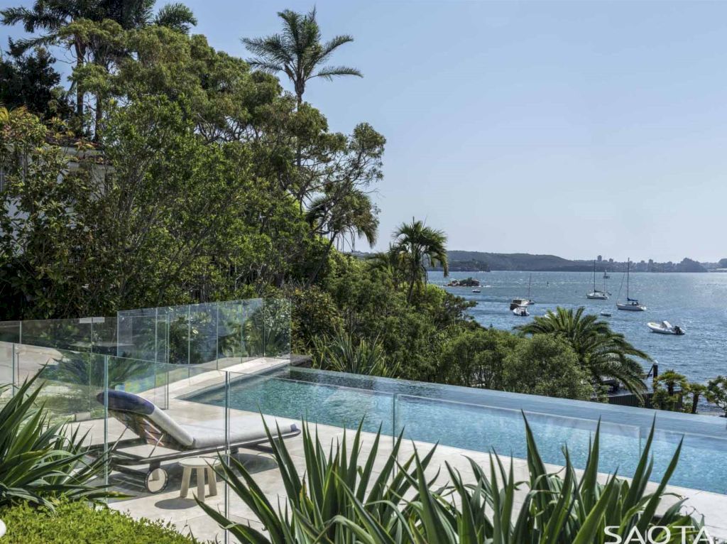Water's Edge with Stone Covers Exterior & Interior by SAOTA
