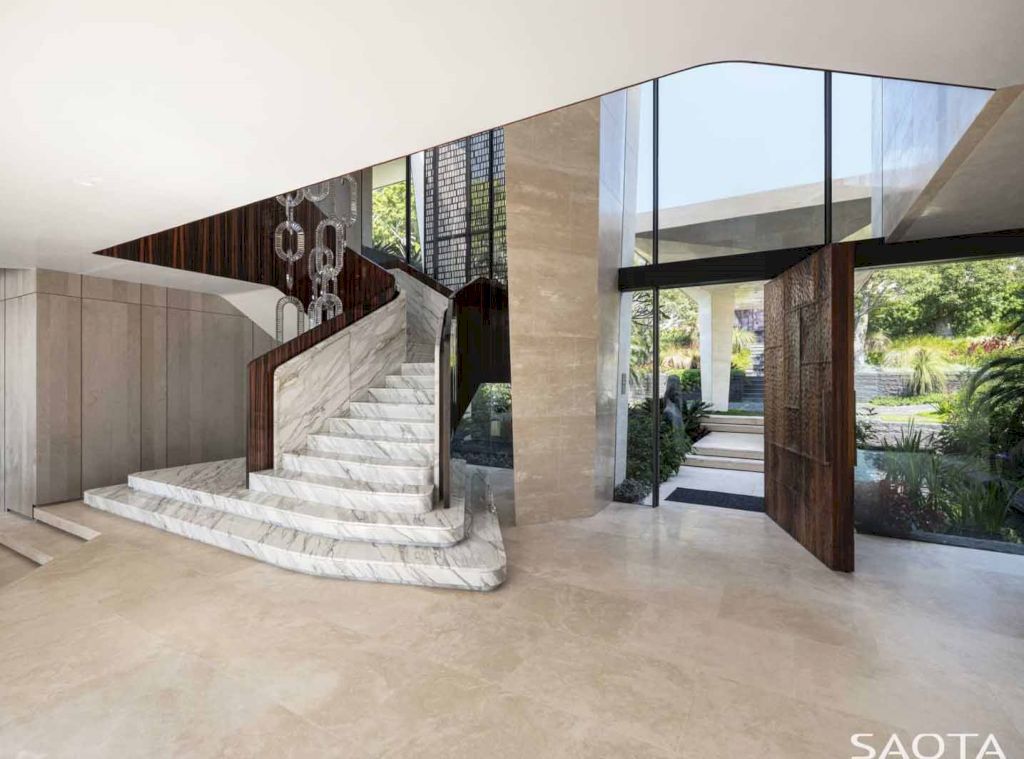 Water's Edge with Stone Covers Exterior & Interior by SAOTA