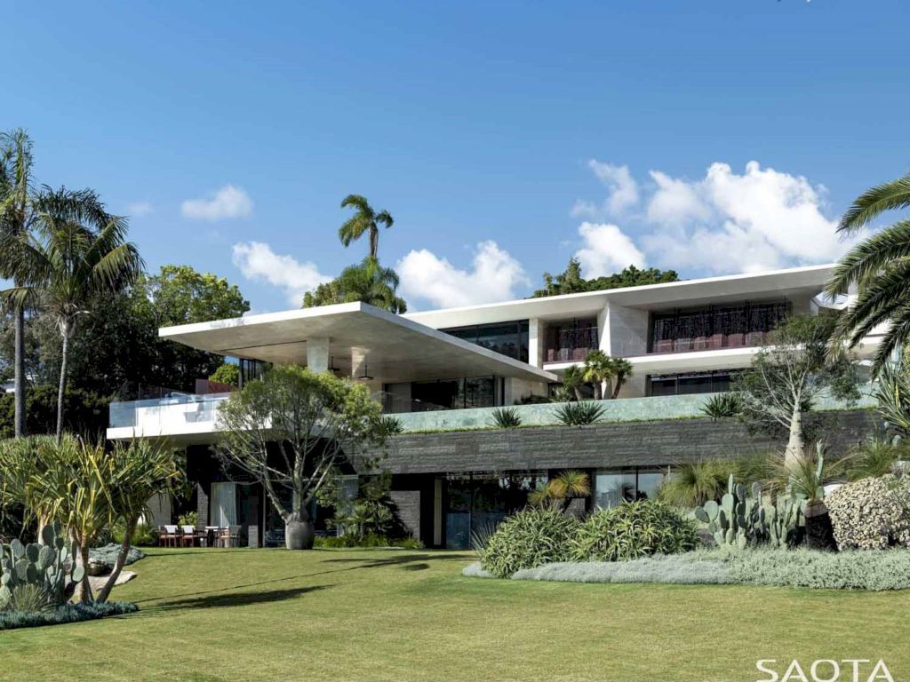 Water's Edge with Stone Covers Exterior & Interior by SAOTA