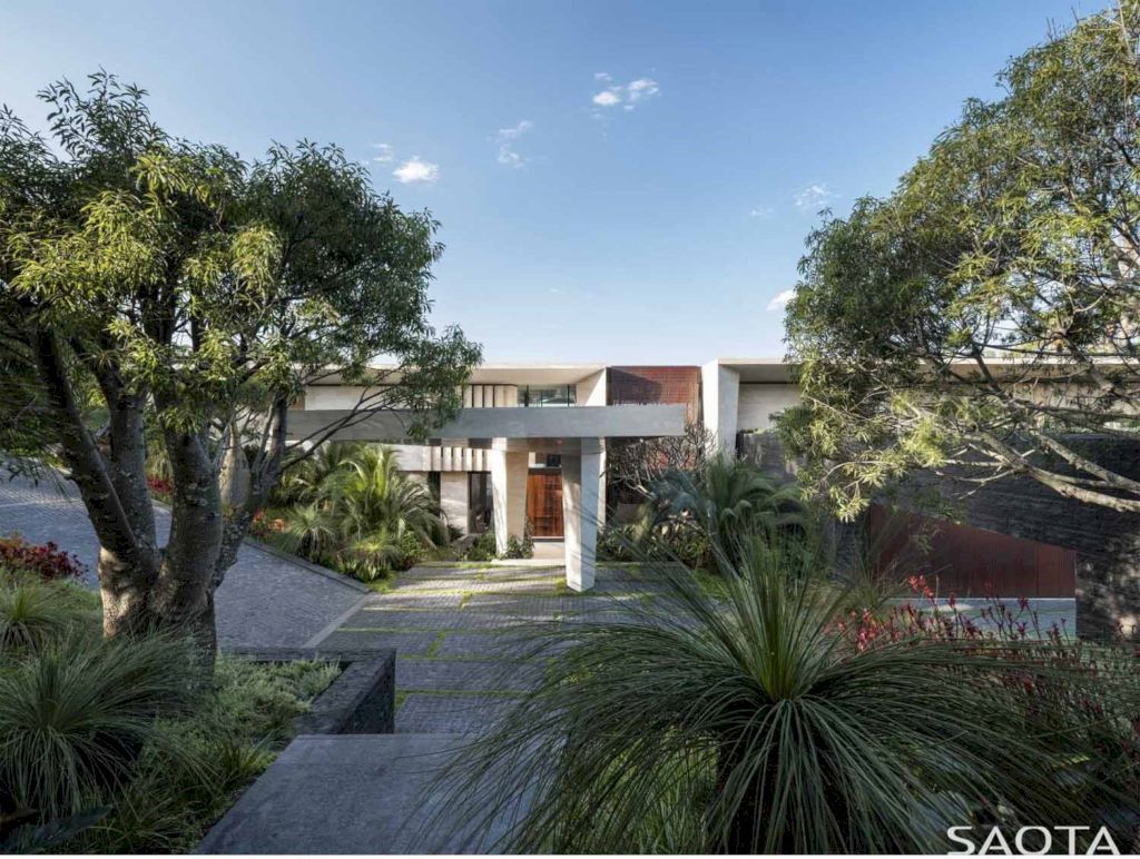 Water's Edge with Stone Covers Exterior & Interior by SAOTA