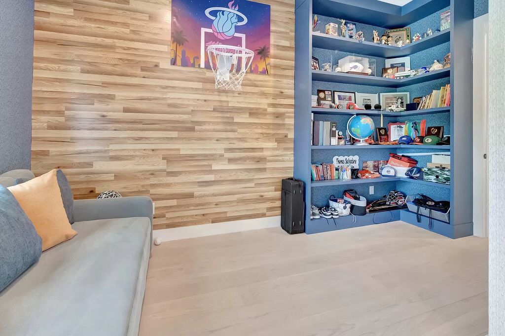 Welcome to this lavish modern luxury estate in the prestigious Boca Bridges. This distinguished "Dali" contemporary masterpiece, one of only seven, spans 8,000 square feet on a large waterfront lot.