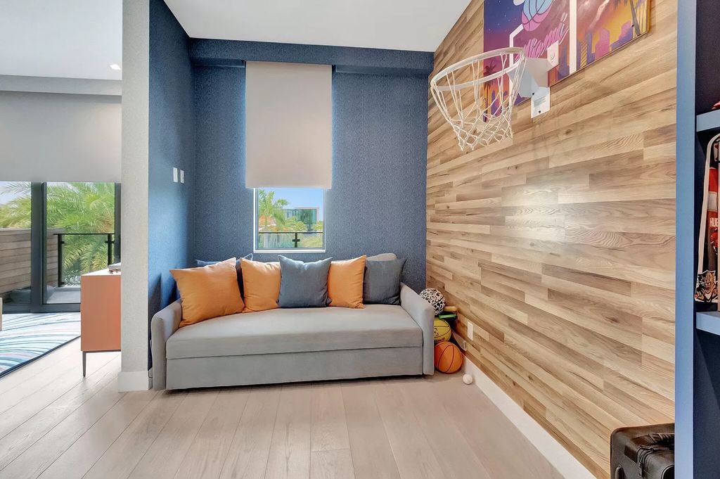 Welcome to this lavish modern luxury estate in the prestigious Boca Bridges. This distinguished "Dali" contemporary masterpiece, one of only seven, spans 8,000 square feet on a large waterfront lot.