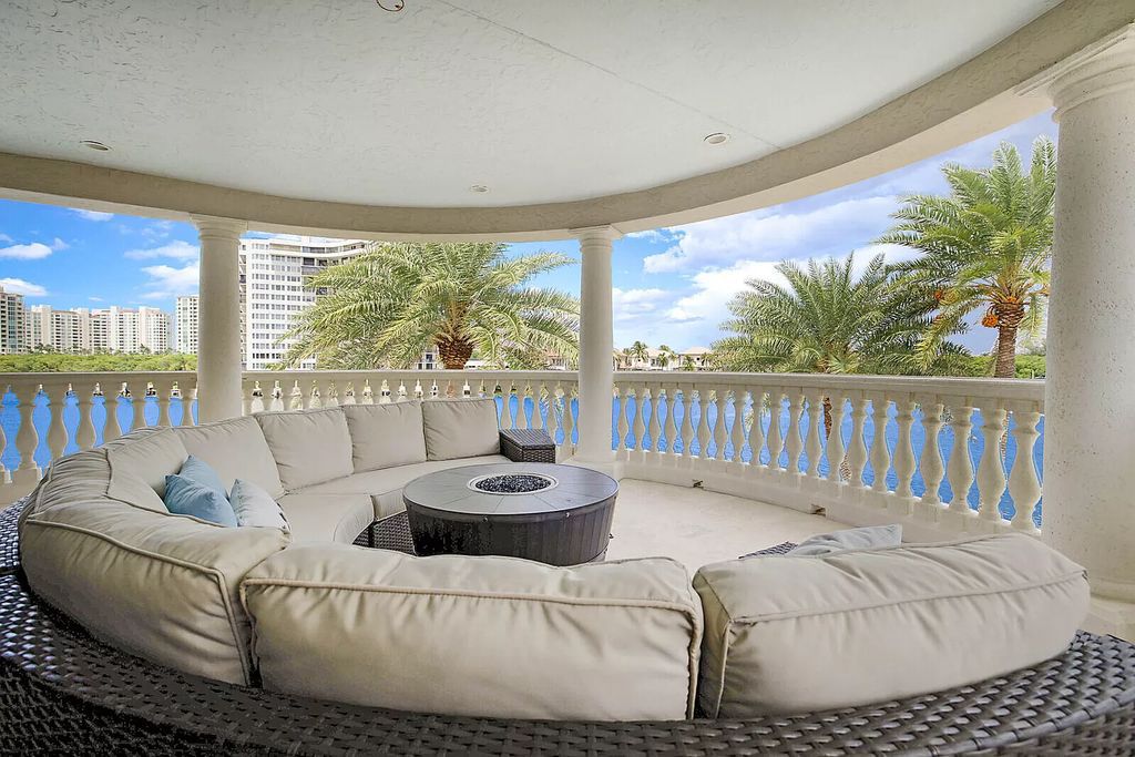 This dream home features a home office, theater, chef's kitchen with high-end appliances, dual-zone wine refrigerators, and lavish architectural details.