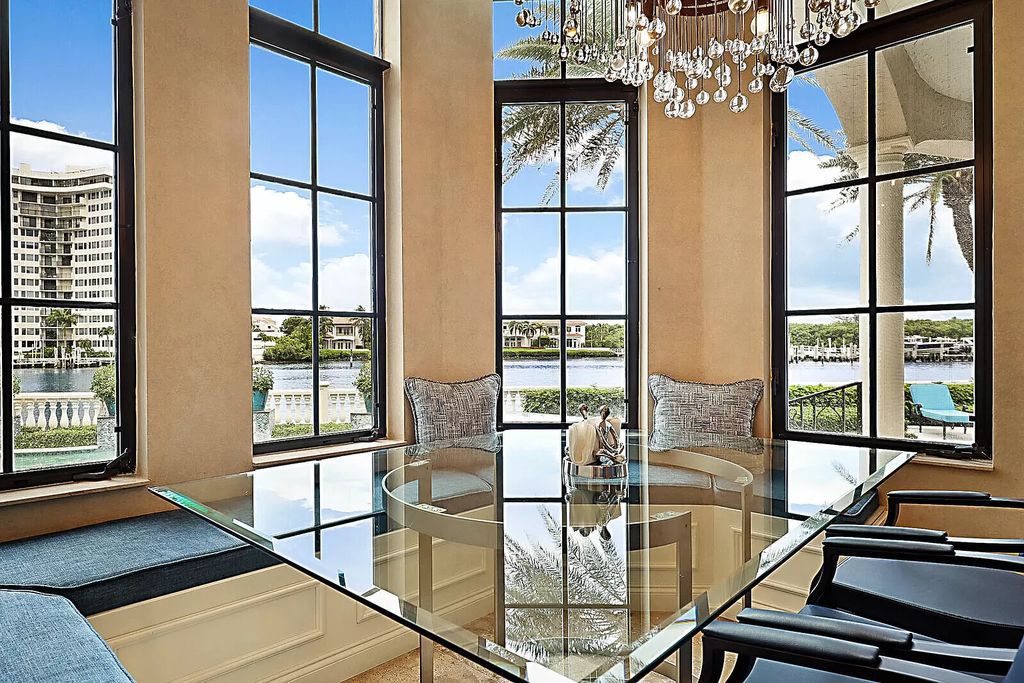 This dream home features a home office, theater, chef's kitchen with high-end appliances, dual-zone wine refrigerators, and lavish architectural details.