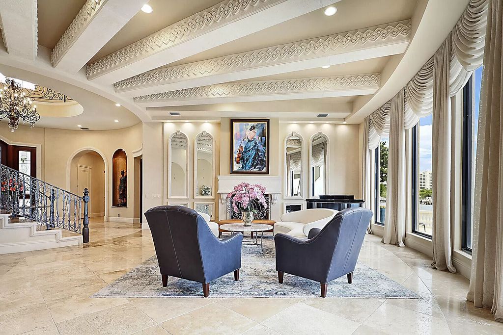 This dream home features a home office, theater, chef's kitchen with high-end appliances, dual-zone wine refrigerators, and lavish architectural details.