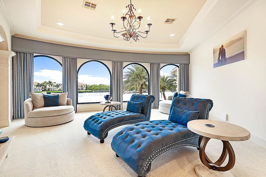 This dream home features a home office, theater, chef's kitchen with high-end appliances, dual-zone wine refrigerators, and lavish architectural details.