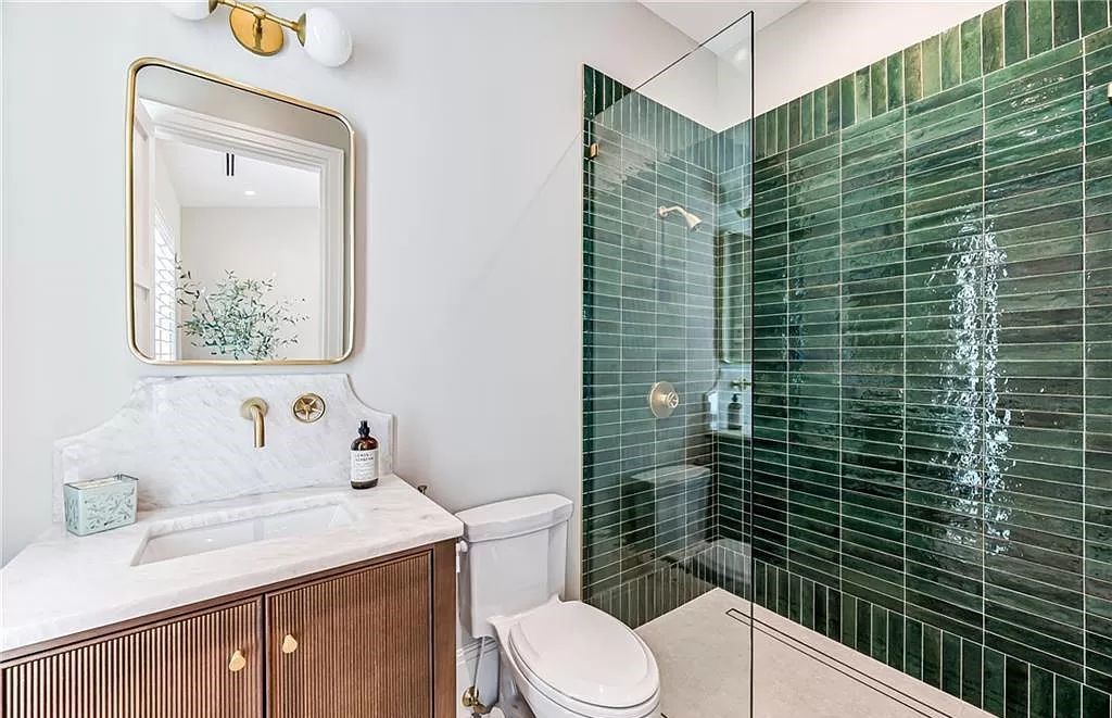 Experience luxury in this modern farmhouse at 712 Killdeer Pl, Naples, Florida. Built by the award-winning Van Emmerik Custom Homes, this 6,500 square feet home features high ceilings, beautiful millwork, and premium finishes.