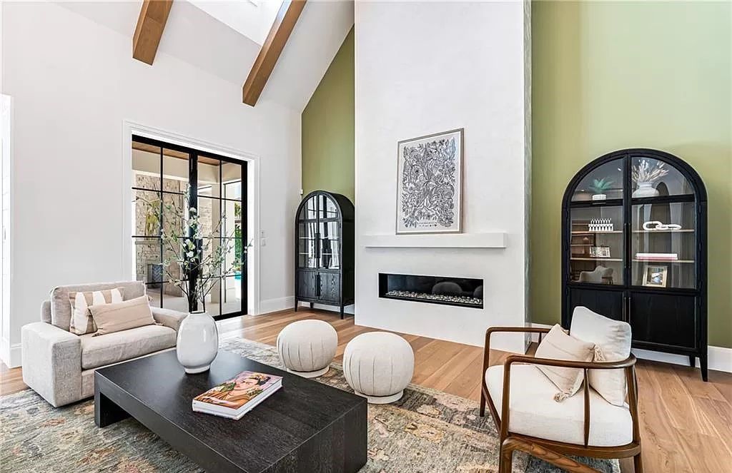 Experience luxury in this modern farmhouse at 712 Killdeer Pl, Naples, Florida. Built by the award-winning Van Emmerik Custom Homes, this 6,500 square feet home features high ceilings, beautiful millwork, and premium finishes.