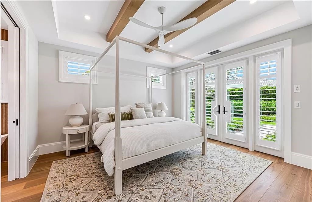 Experience luxury in this modern farmhouse at 712 Killdeer Pl, Naples, Florida. Built by the award-winning Van Emmerik Custom Homes, this 6,500 square feet home features high ceilings, beautiful millwork, and premium finishes.