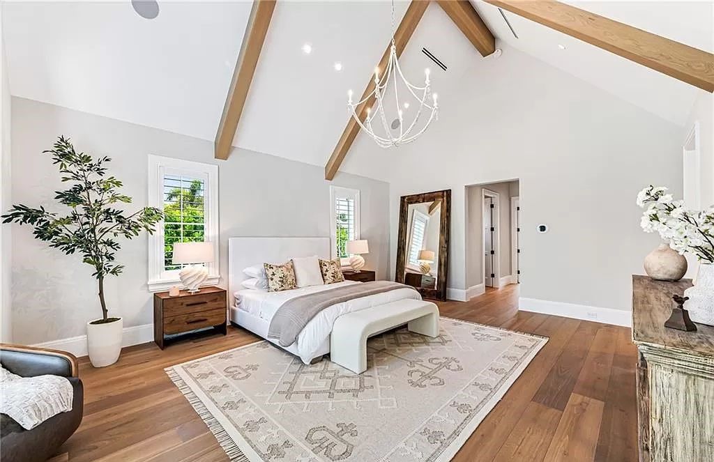 Experience luxury in this modern farmhouse at 712 Killdeer Pl, Naples, Florida. Built by the award-winning Van Emmerik Custom Homes, this 6,500 square feet home features high ceilings, beautiful millwork, and premium finishes.