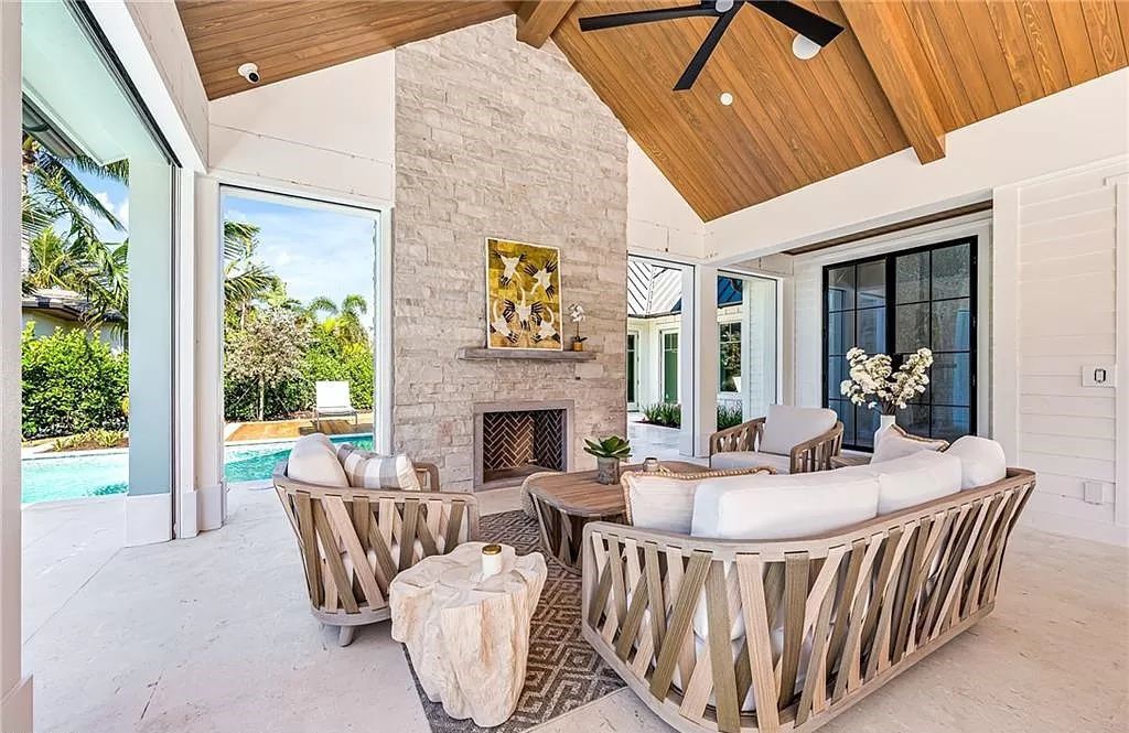 Experience luxury in this modern farmhouse at 712 Killdeer Pl, Naples, Florida. Built by the award-winning Van Emmerik Custom Homes, this 6,500 square feet home features high ceilings, beautiful millwork, and premium finishes.