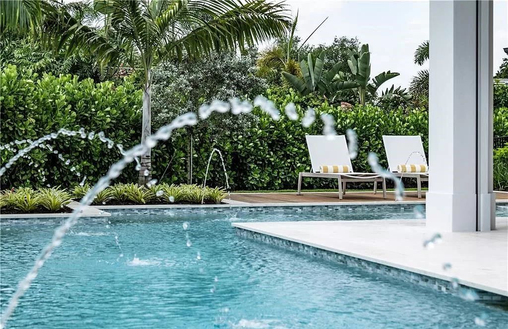 Experience luxury in this modern farmhouse at 712 Killdeer Pl, Naples, Florida. Built by the award-winning Van Emmerik Custom Homes, this 6,500 square feet home features high ceilings, beautiful millwork, and premium finishes.