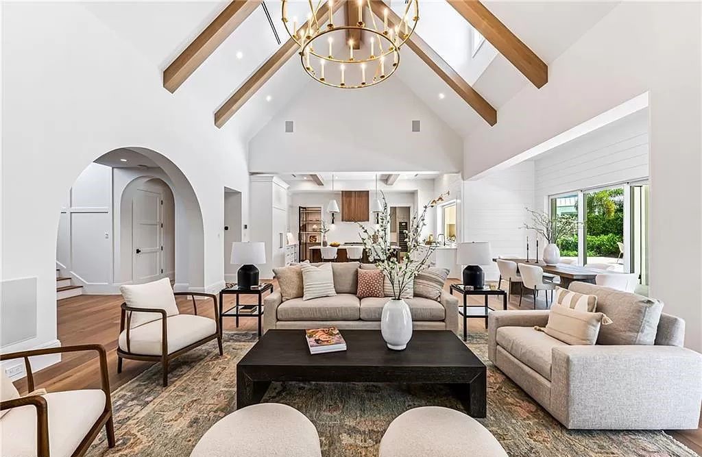 Experience luxury in this modern farmhouse at 712 Killdeer Pl, Naples, Florida. Built by the award-winning Van Emmerik Custom Homes, this 6,500 square feet home features high ceilings, beautiful millwork, and premium finishes.