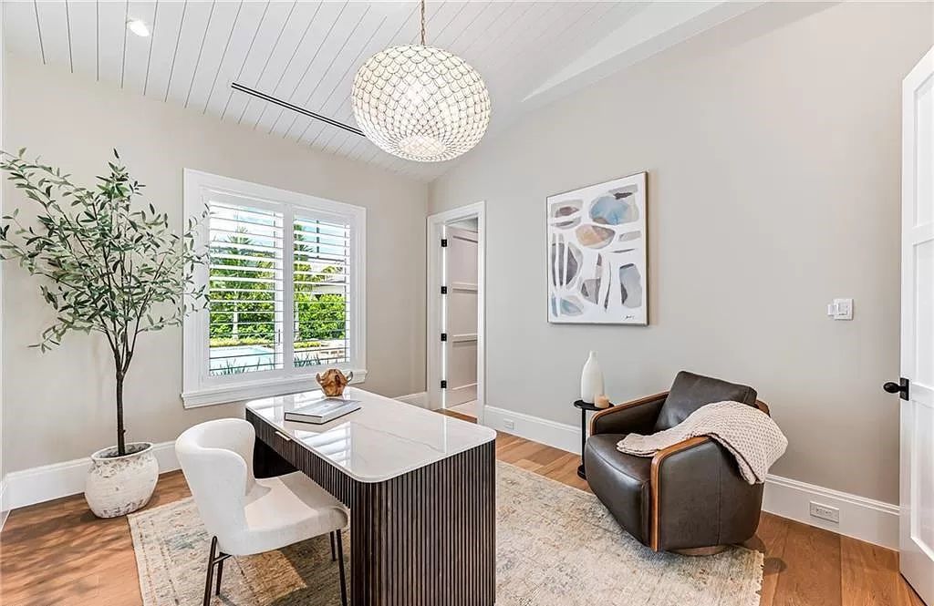 Experience luxury in this modern farmhouse at 712 Killdeer Pl, Naples, Florida. Built by the award-winning Van Emmerik Custom Homes, this 6,500 square feet home features high ceilings, beautiful millwork, and premium finishes.