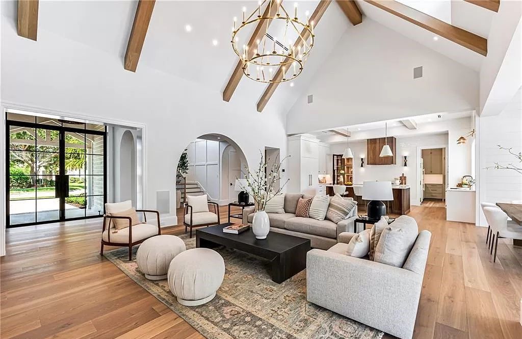 Experience luxury in this modern farmhouse at 712 Killdeer Pl, Naples, Florida. Built by the award-winning Van Emmerik Custom Homes, this 6,500 square feet home features high ceilings, beautiful millwork, and premium finishes.