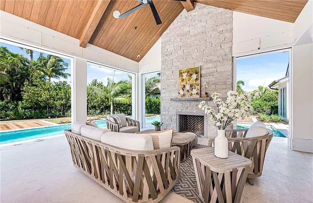 Experience luxury in this modern farmhouse at 712 Killdeer Pl, Naples, Florida. Built by the award-winning Van Emmerik Custom Homes, this 6,500 square feet home features high ceilings, beautiful millwork, and premium finishes.