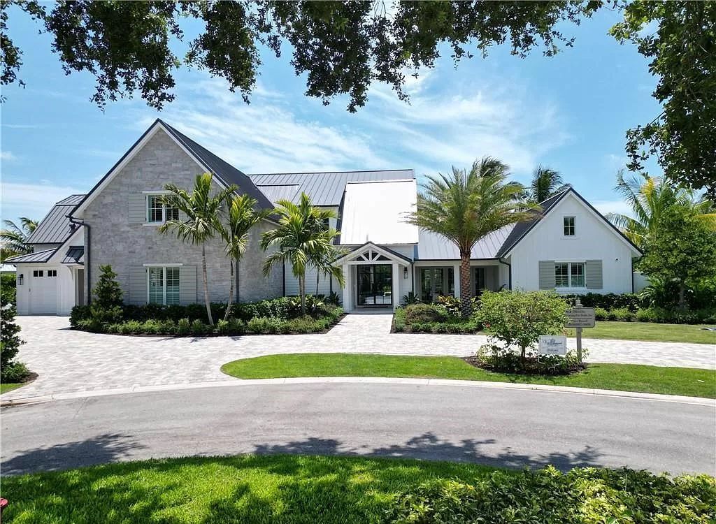 Experience luxury in this modern farmhouse at 712 Killdeer Pl, Naples, Florida. Built by the award-winning Van Emmerik Custom Homes, this 6,500 square feet home features high ceilings, beautiful millwork, and premium finishes.