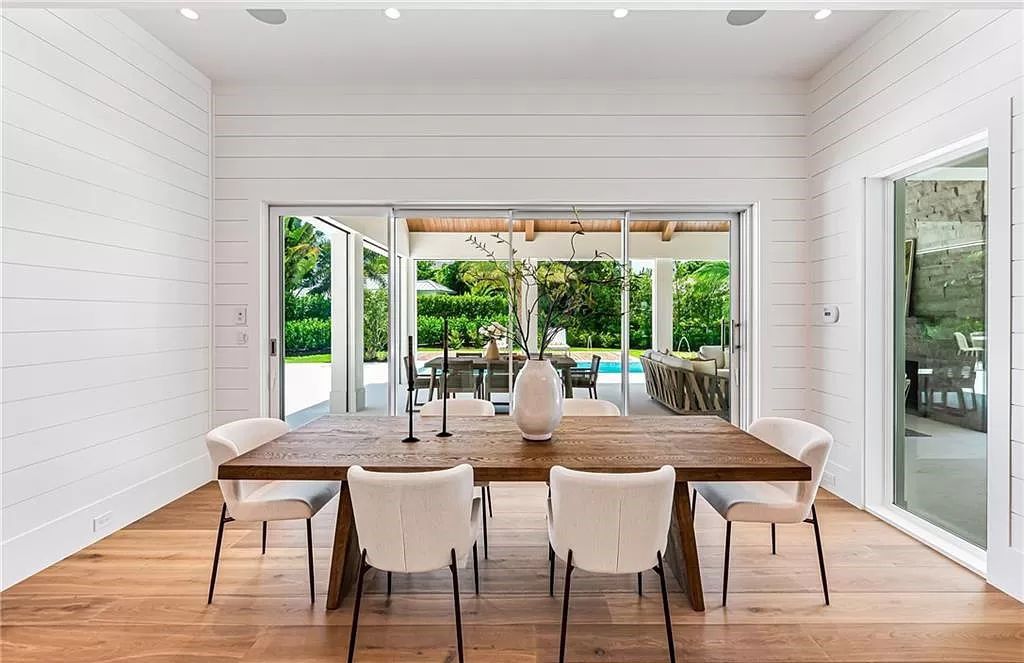 Experience luxury in this modern farmhouse at 712 Killdeer Pl, Naples, Florida. Built by the award-winning Van Emmerik Custom Homes, this 6,500 square feet home features high ceilings, beautiful millwork, and premium finishes.