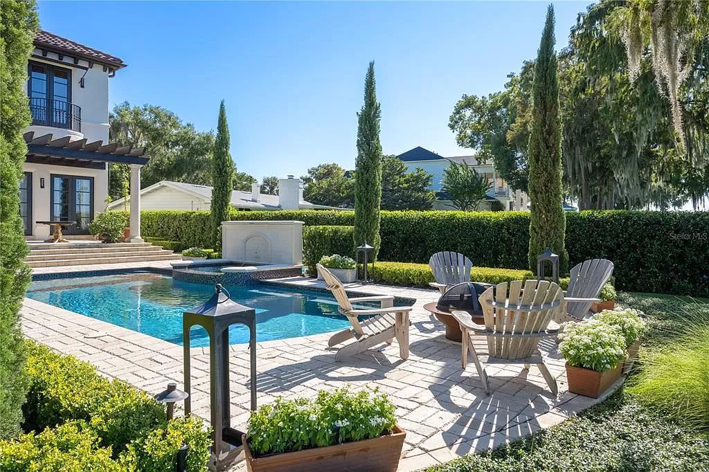 Introducing a rare opportunity to own a unique lakeside property on Lake Maitland, part of the prestigious Chain of Lakes.