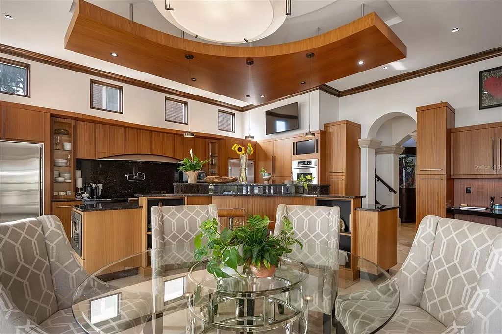 Introducing a rare opportunity to own a unique lakeside property on Lake Maitland, part of the prestigious Chain of Lakes.