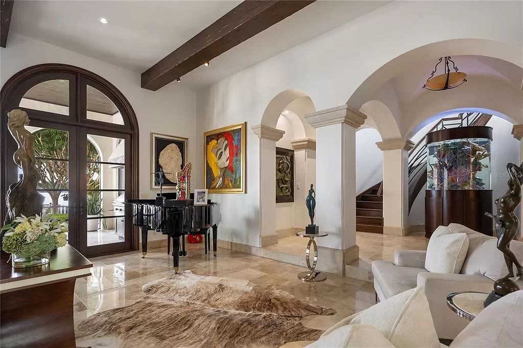 Introducing a rare opportunity to own a unique lakeside property on Lake Maitland, part of the prestigious Chain of Lakes.